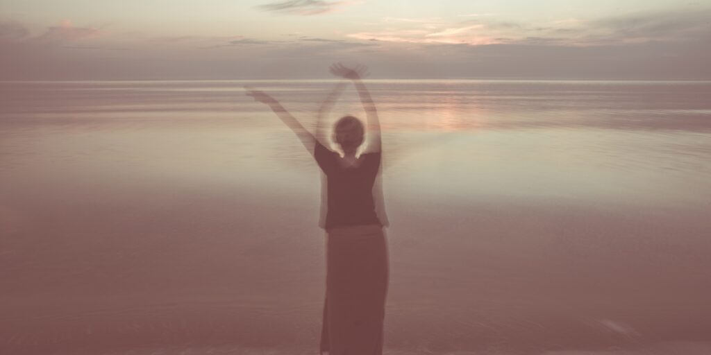 Girl standing on beach accessing Spiritual Intuition